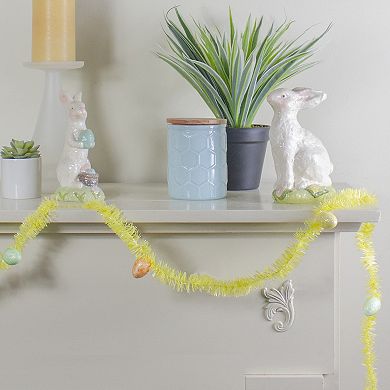 25' x 1.25" Yellow Spring Tinsel Artificial Garland with Easter Eggs - Unlit