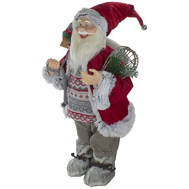 2' Standing Santa Christmas Figure Carrying Snow Shoes and Presents