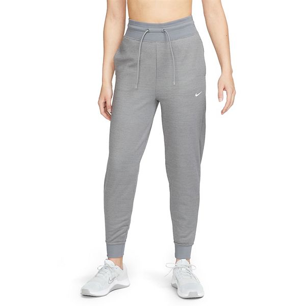 Nike Plus Mini Swoosh Oversized joggers in Natural