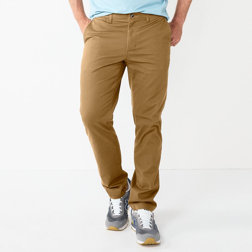 A man wearing khaki pants