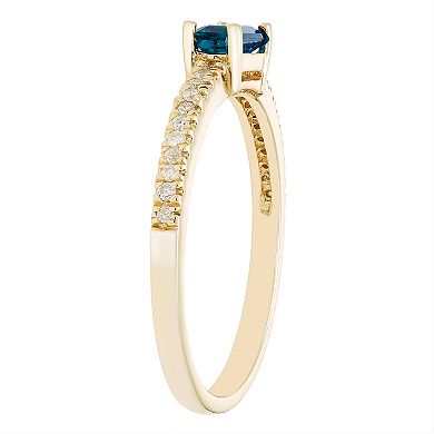 The Regal Collection 14k Gold 1/10 Carat T.W. Diamond & London Blue Topaz Stackable Ring