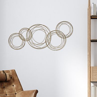 Stratton Home Decor Layered Gold Finish Rings Wall Decor