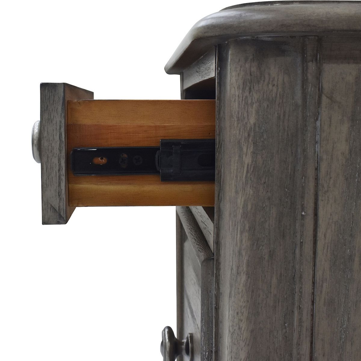 Nightstand charging station with outlet panel opened from drawer cavity
