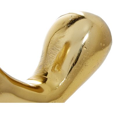 CosmoLiving by Cosmopolitan Abstract Gold Finish Sculpture Table Decor