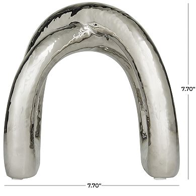 CosmoLiving by Cosmopolitan Arched Sculpture Table Decor