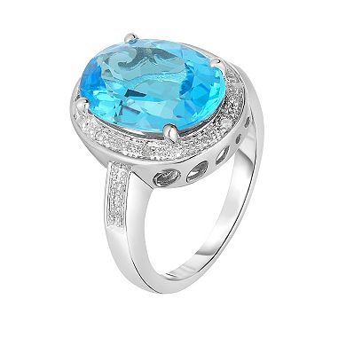 Oro Leoni Sterling Silver Blue Topaz & 1/10 Carat T.W. Diamond Oval Halo Ring