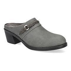 Grey clogs and store mules