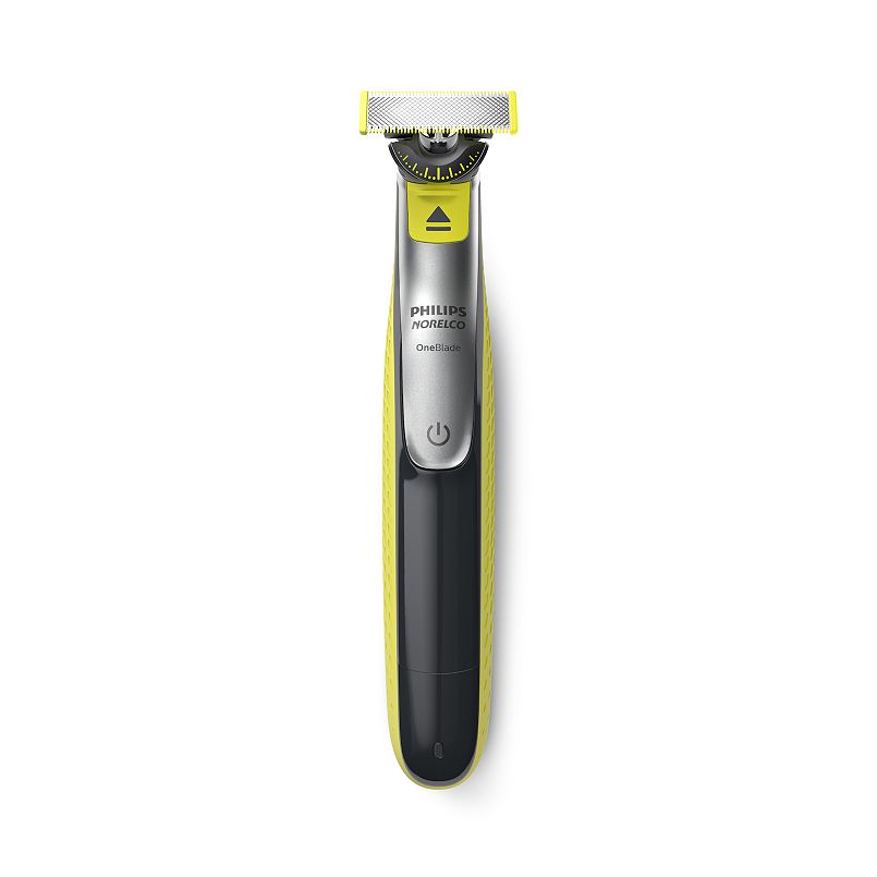 A black, green, and silver electric shaver