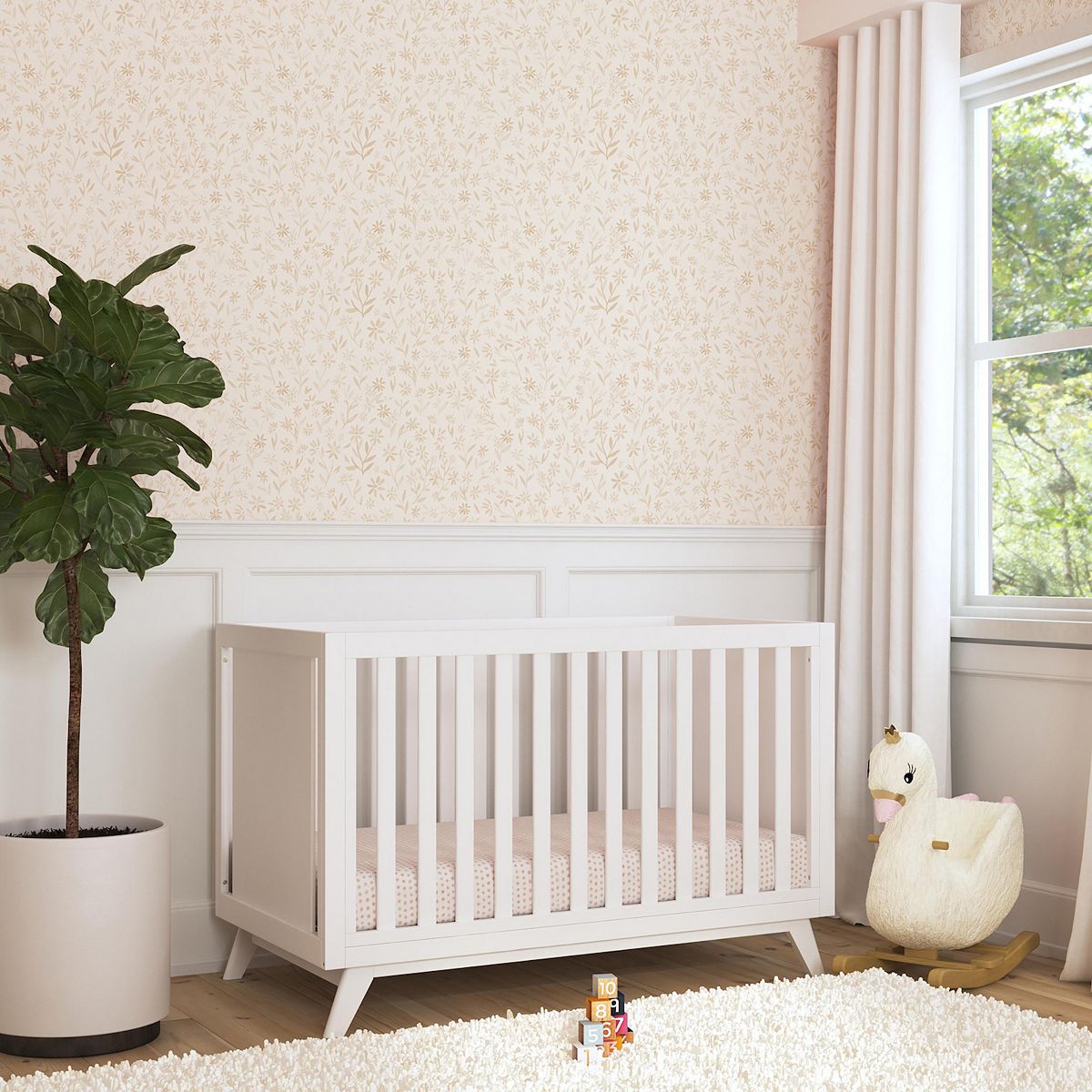 White DaVinci Otto 3-in-1 convertible crib in a nursery