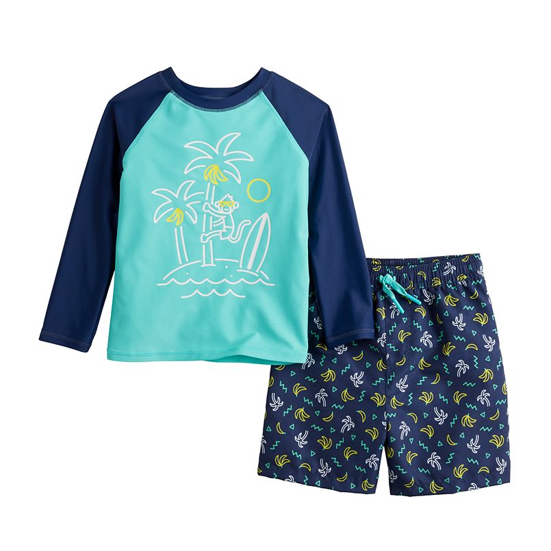 blue and green shorts and swim shirt with a monkey on an island