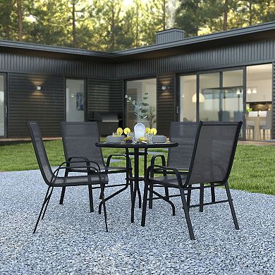 Emma and Oliver Five Piece Patio Table Set with Round Metal Table with Tempered Glass Top and 4 Flex Comfort Stacking Chairs