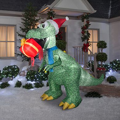National Tree Company Animated Airblown Light-Up 9.5' Dinosaur T-Rex with Present