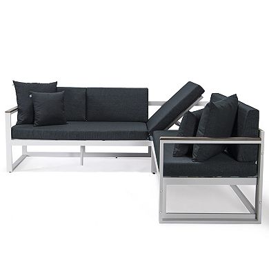 LeisureMod Chelsea White Sectional With Adjustable Headrest & Coffee Table With Cushions