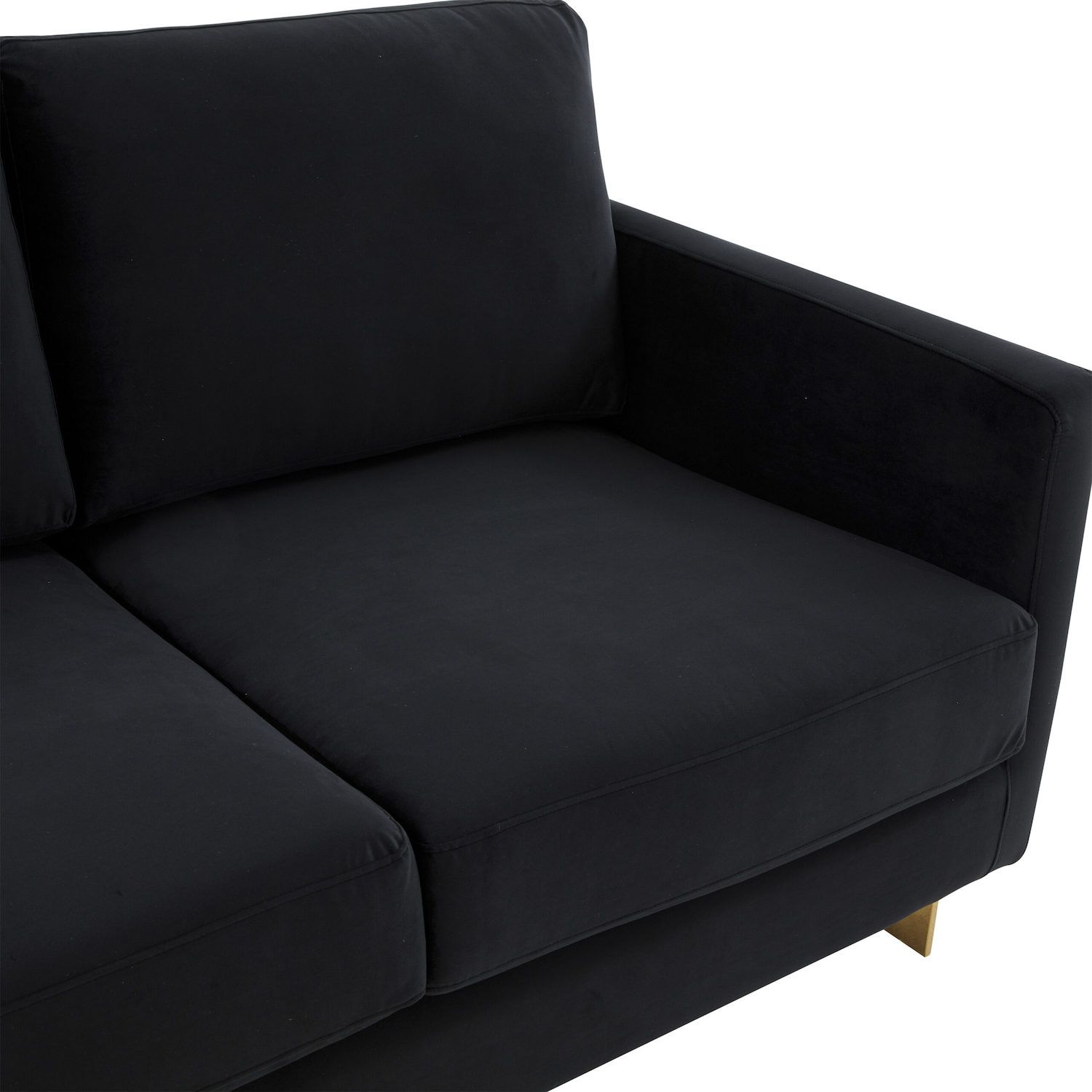 Close-up of black velvet loveseat seat cushion and arm