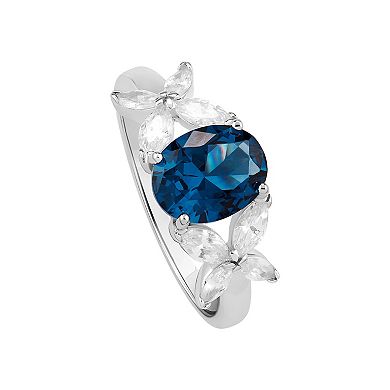PRIMROSE Sterling Silver Oval Simulated Sapphire & Cubic Zirconia Flower Ring