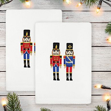 Linum Home Textiles 2-Piece Christmas Embroidered Nutcrackers Luxury Cotton Hand Towel Set