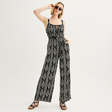Juniors' Live To Be Spoiled Sleeveless Tie Front Jumpsuit