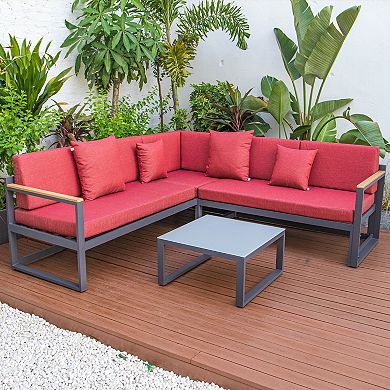 LeisureMod Chelsea Black Sectional With Adjustable Headrest & Coffee Table With Cushions