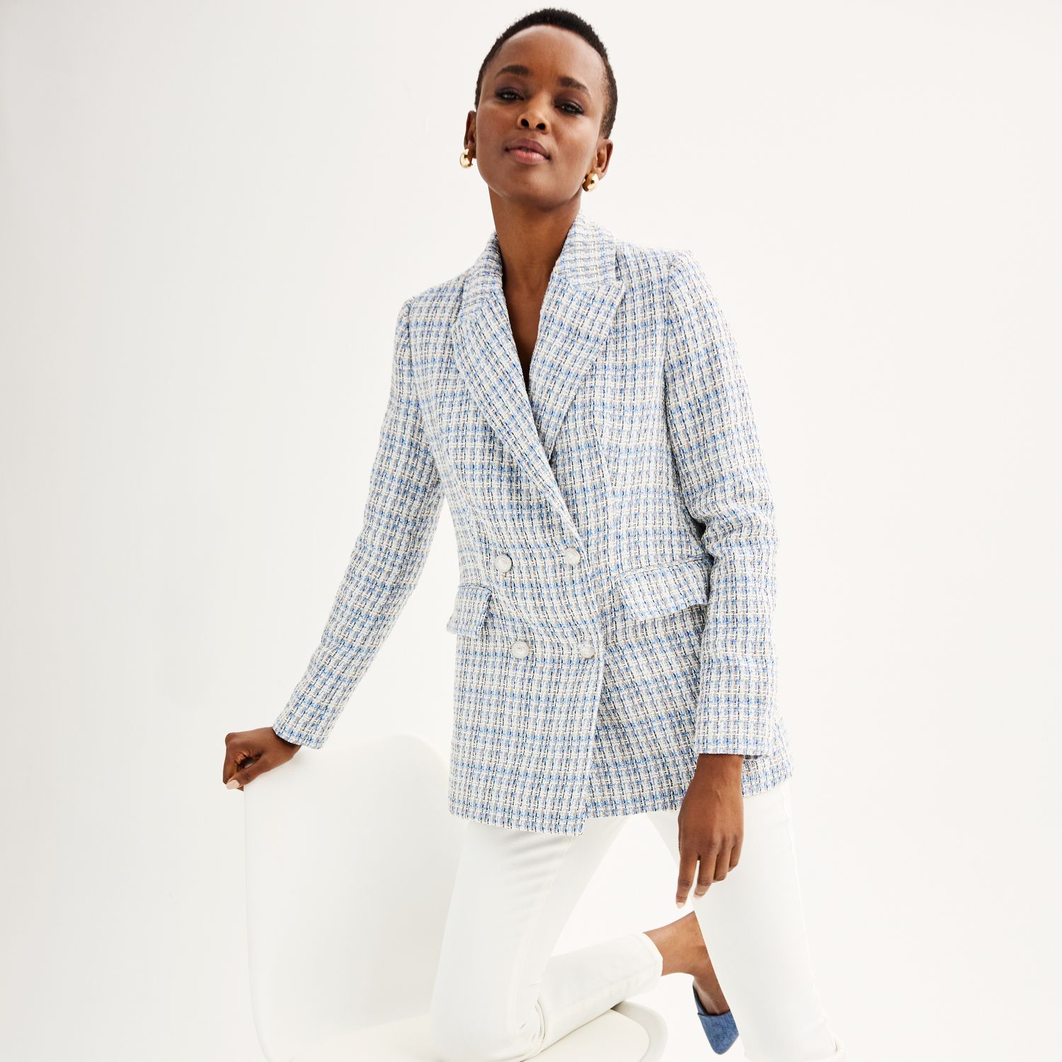 A tweed blazer harkens back to throwback ensembles the are ideal for this trend.