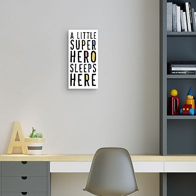 A Little Superhero Sleeps Here Canvas Wall Art