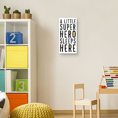 A Little Superhero Sleeps Here Canvas Wall Art