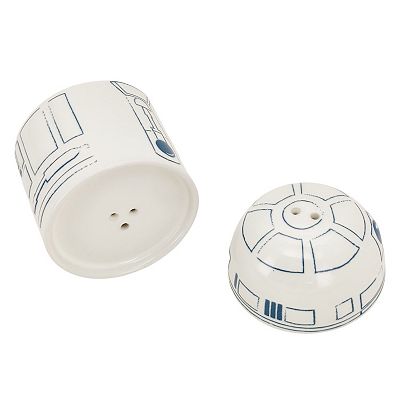 Awesome Star Wars collectibles. Has a set of ceramic salt and pepper shakers, Stormtrooper is salt and Darth Vader is pepper. Also has a cool 3D character mug, it's Darth Vader. Both