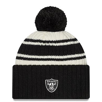 Youth New Era Cream/Black Las Vegas Raiders 2022 Sideline Sport Cuffed Pom Knit Hat