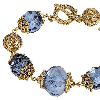 1928 Gold Tone Blue Beaded Toggle Bracelet