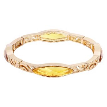 1928 Gold Tone Oval Topaz Color Stretch Bracelet