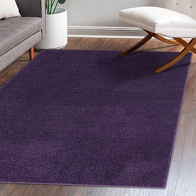 Haze Solid Low Pile Area Rug Purple