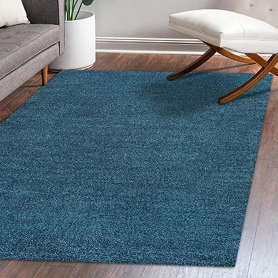 Haze Solid Low Pile Area Rug Turquoise