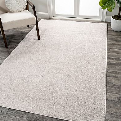 Haze Solid Low Pile Area Rug Ivory