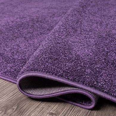 Haze Solid Low Pile Area Rug Black