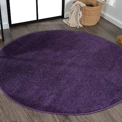Haze Solid Low Pile Area Rug Black