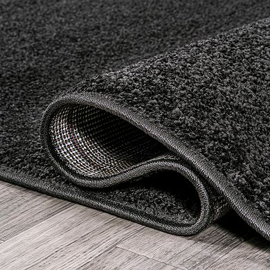 Haze Solid Low Pile Area Rug Black