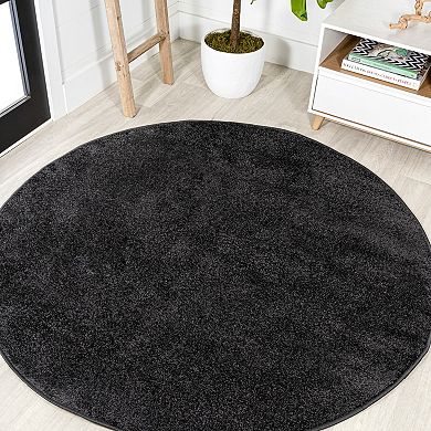 Haze Solid Low Pile Area Rug Black