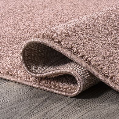 Haze Solid Low Pile Area Rug Pink