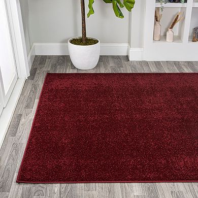 Haze Solid Low Pile Area Rug Dark Red