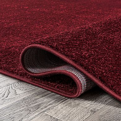 Haze Solid Low Pile Area Rug Dark Red