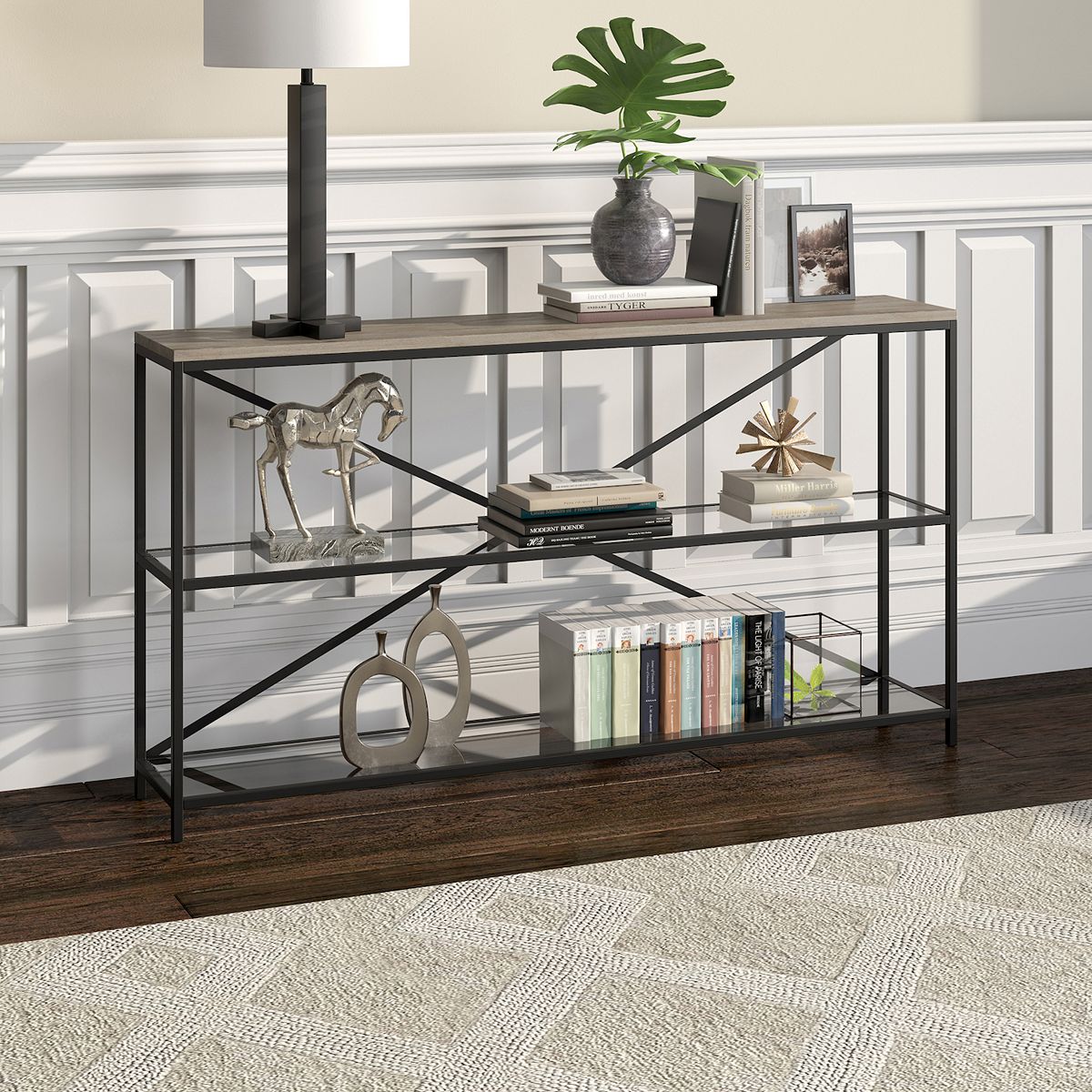 Rectangular console table with wood top and black geometric metal frame