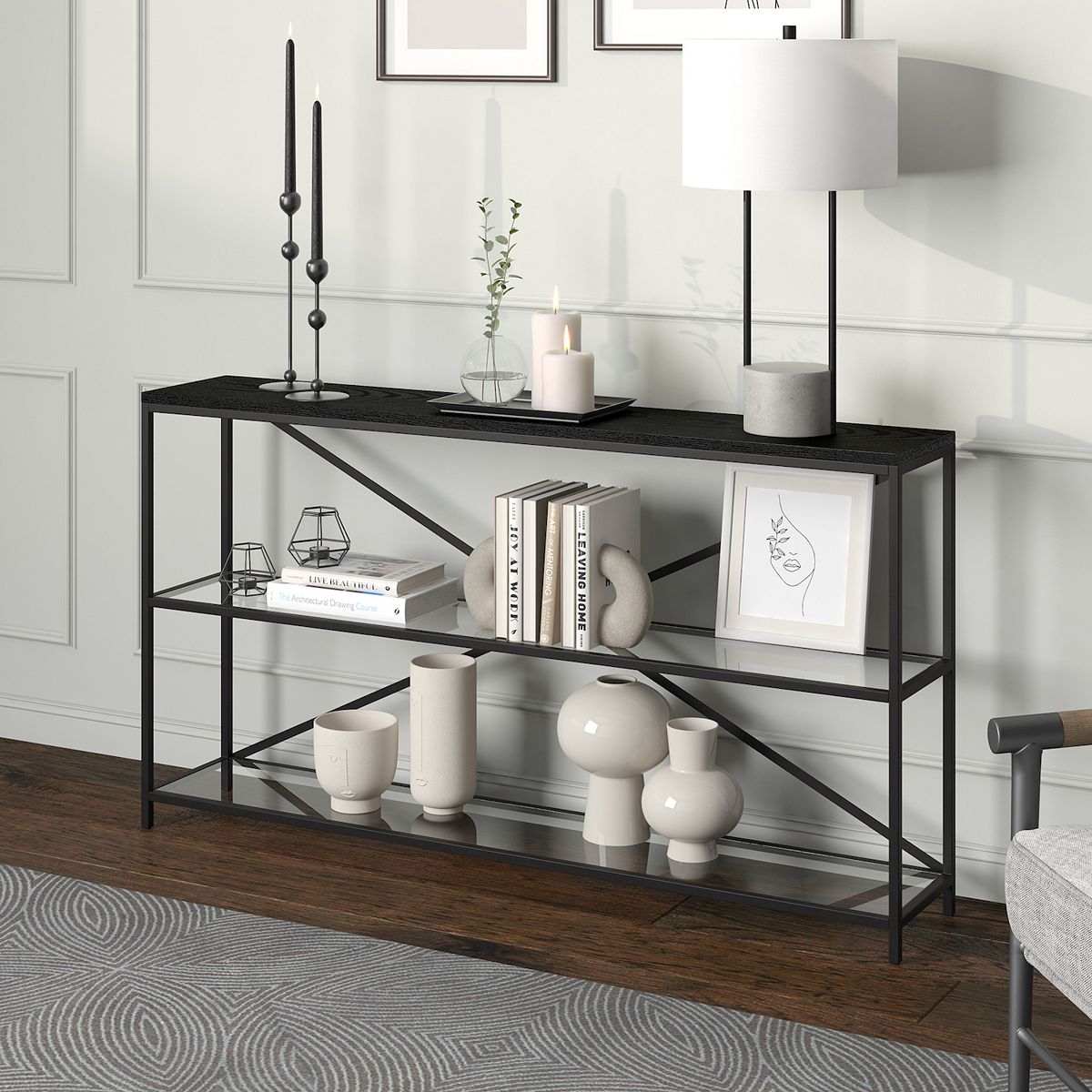 Console table featuring dark metal frame and medium-brown wood top