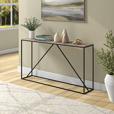 Console table used as entryway decor with plants and vases