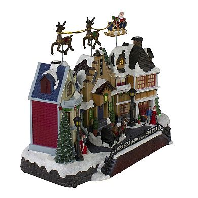 Northlight 16-in. LED Lighted and Animated Christmas Village with Flying Sleigh Table Decor