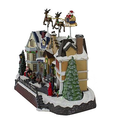 Northlight 16-in. LED Lighted and Animated Christmas Village with Flying Sleigh Table Decor