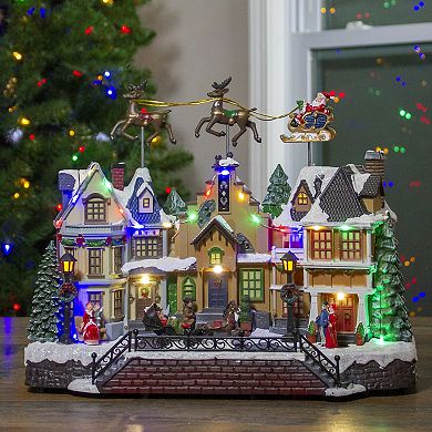 Northlight 16-in. LED Lighted and Animated Christmas Village with Flying Sleigh Table Decor