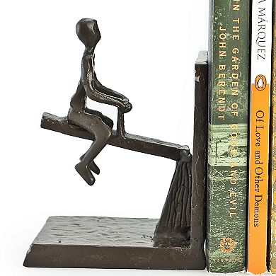 Children Playing On A See-saw Metal Bookend Set