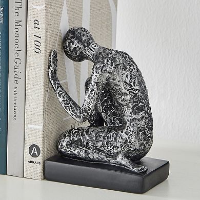 Danya B. Kneeling Figure Sculptures Polyresin Silver And Black Finish Bookend Set Of 2