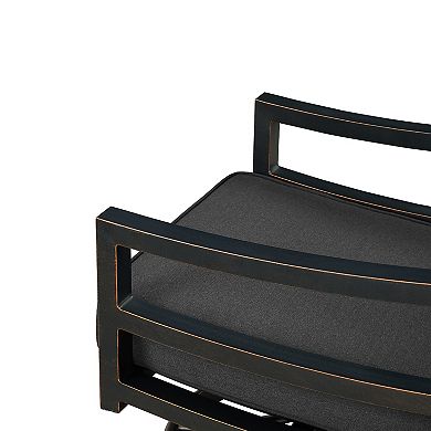 Close-up of armrest and cushion edge on black outdoor chair
