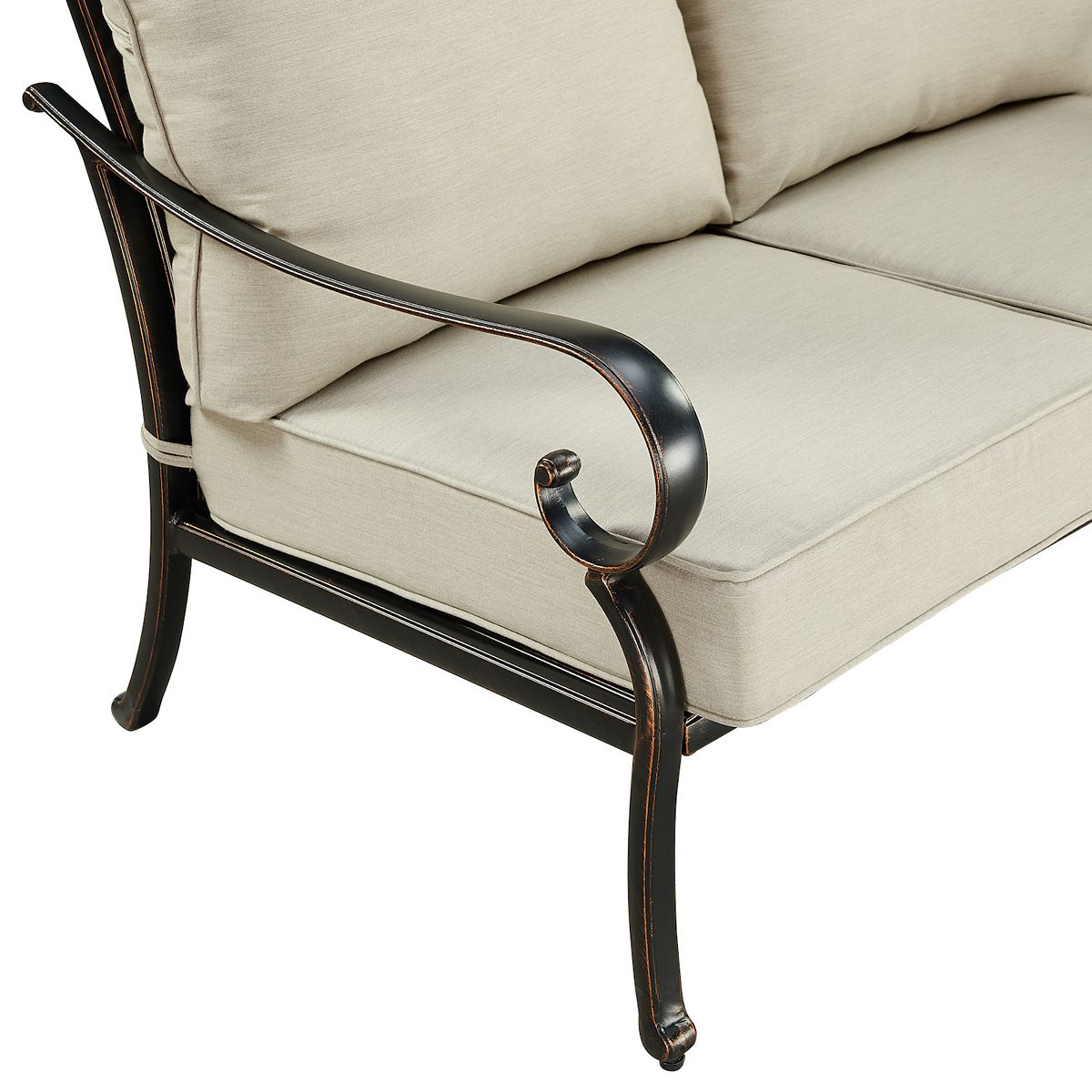 Loveseat arm and seat cushion detail in light beige