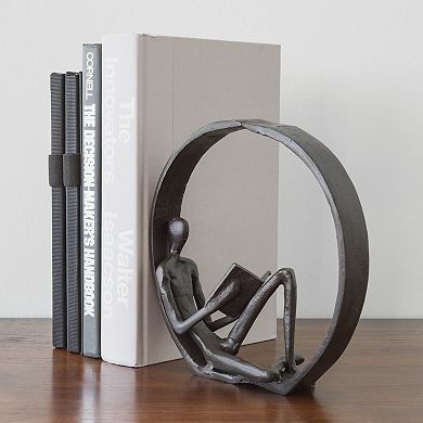 Encircled Reader Iron Sculpture